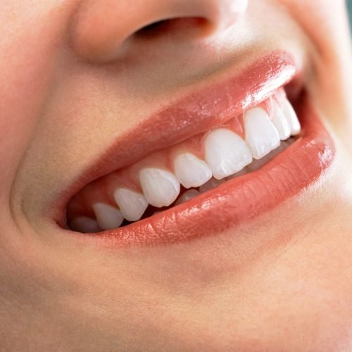 a-closeup-shot-of-a-smiling-woman-showing-her-clea-2026-03-26-05-33-05-utc